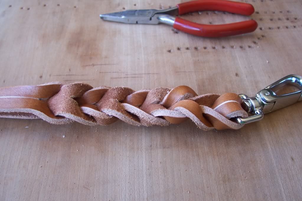 A picture tutorial of homemade leather leashes with braided ends
